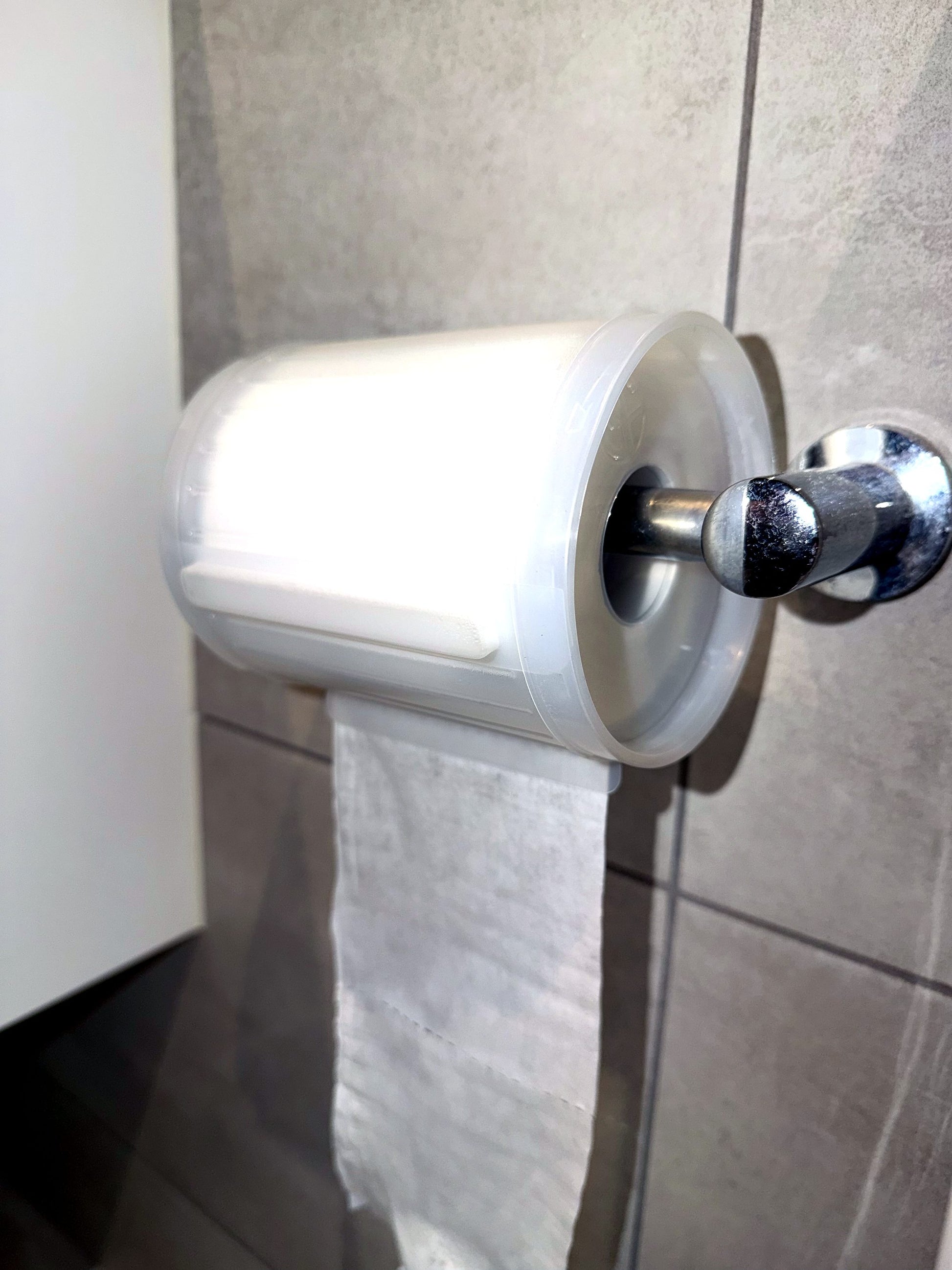 Wipeez roll side profile on wall-mounted holder